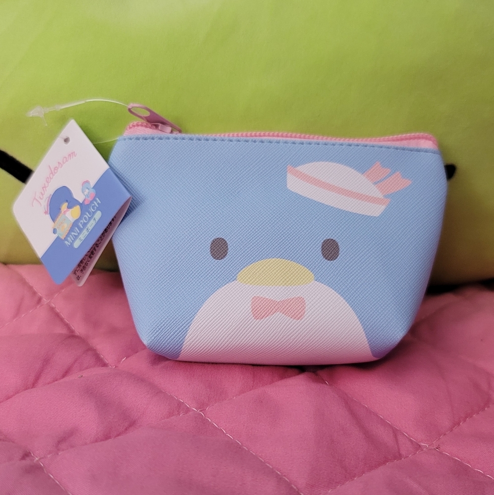 SOLD!SOLD! NOT FOR SALE.        Tuxedo Sam Sanrio Coin Purse